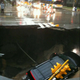 Illustration for article titled Milwaukee Sinkhole Swallows Cadillac Escalade, Traffic Light